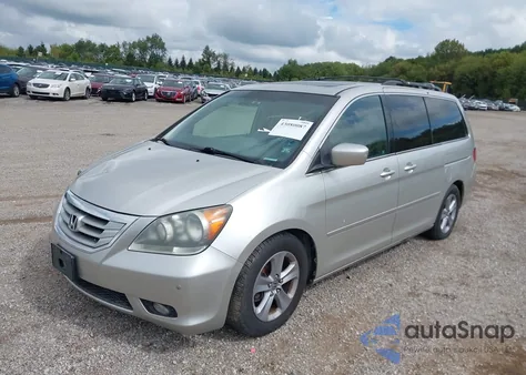 2008 Honda Odyssey Touring z USA, uszkodzony, nr VIN 5FNRL38968B043161